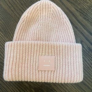 Face logo oversized turned-up cuff toque